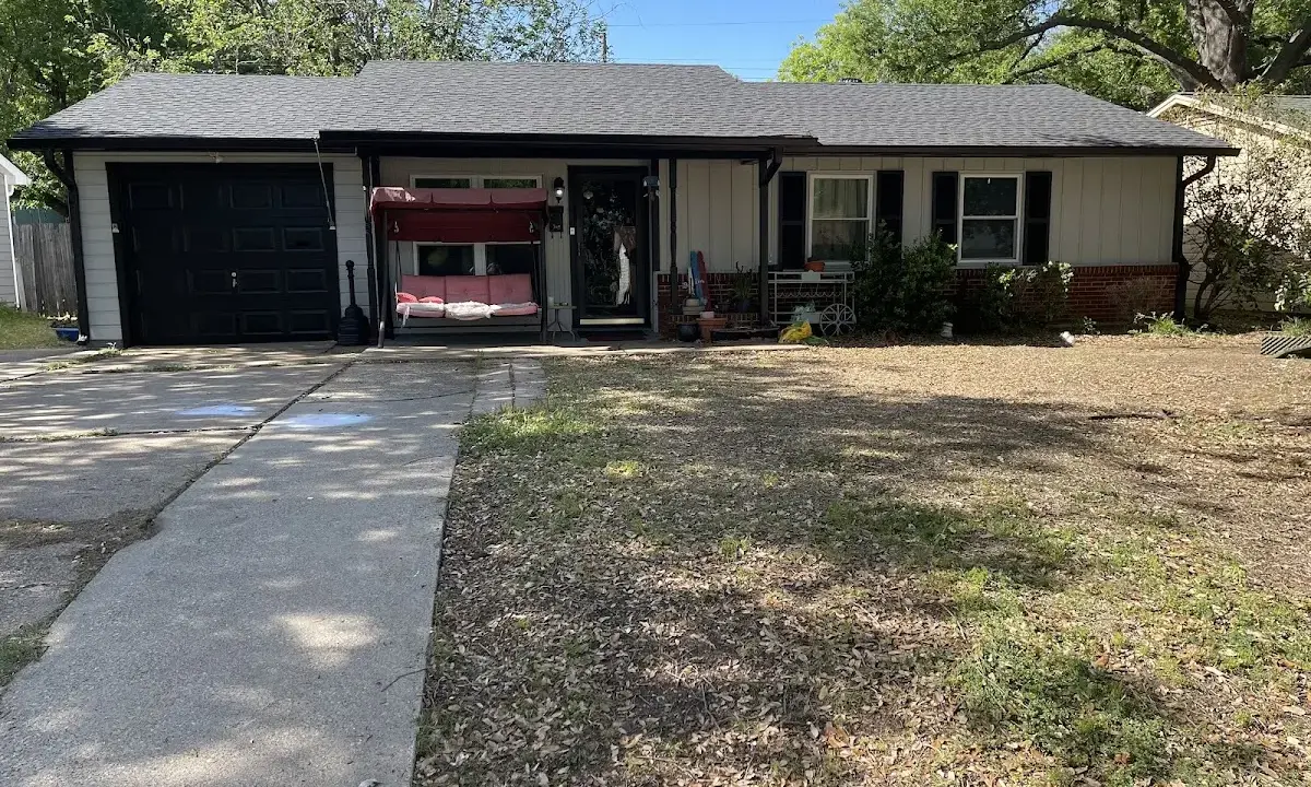 Asphalt Shingle Roof Repair crew at work on a residential roof in Columbia